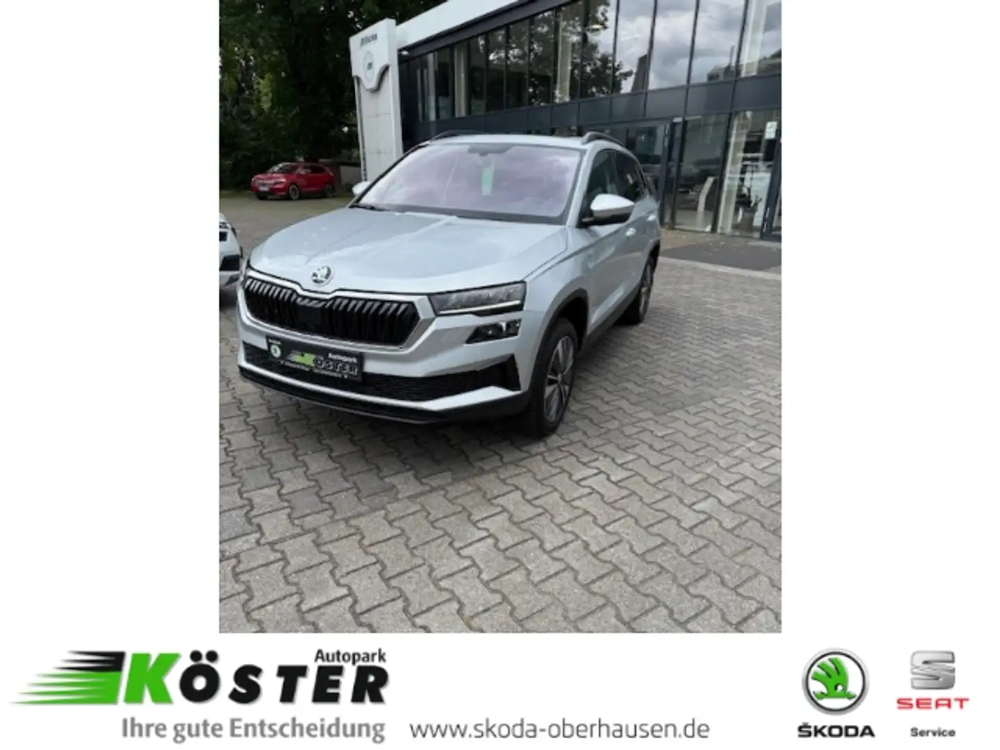 Skoda Karoq Tour 1.5 TSI ACT DSG Navi Pannoramadach Silber - 1