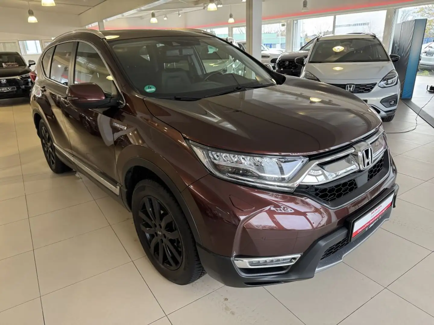Honda CR-V 2.0 i-MMD Hybrid 4WD Executive Braun - 1