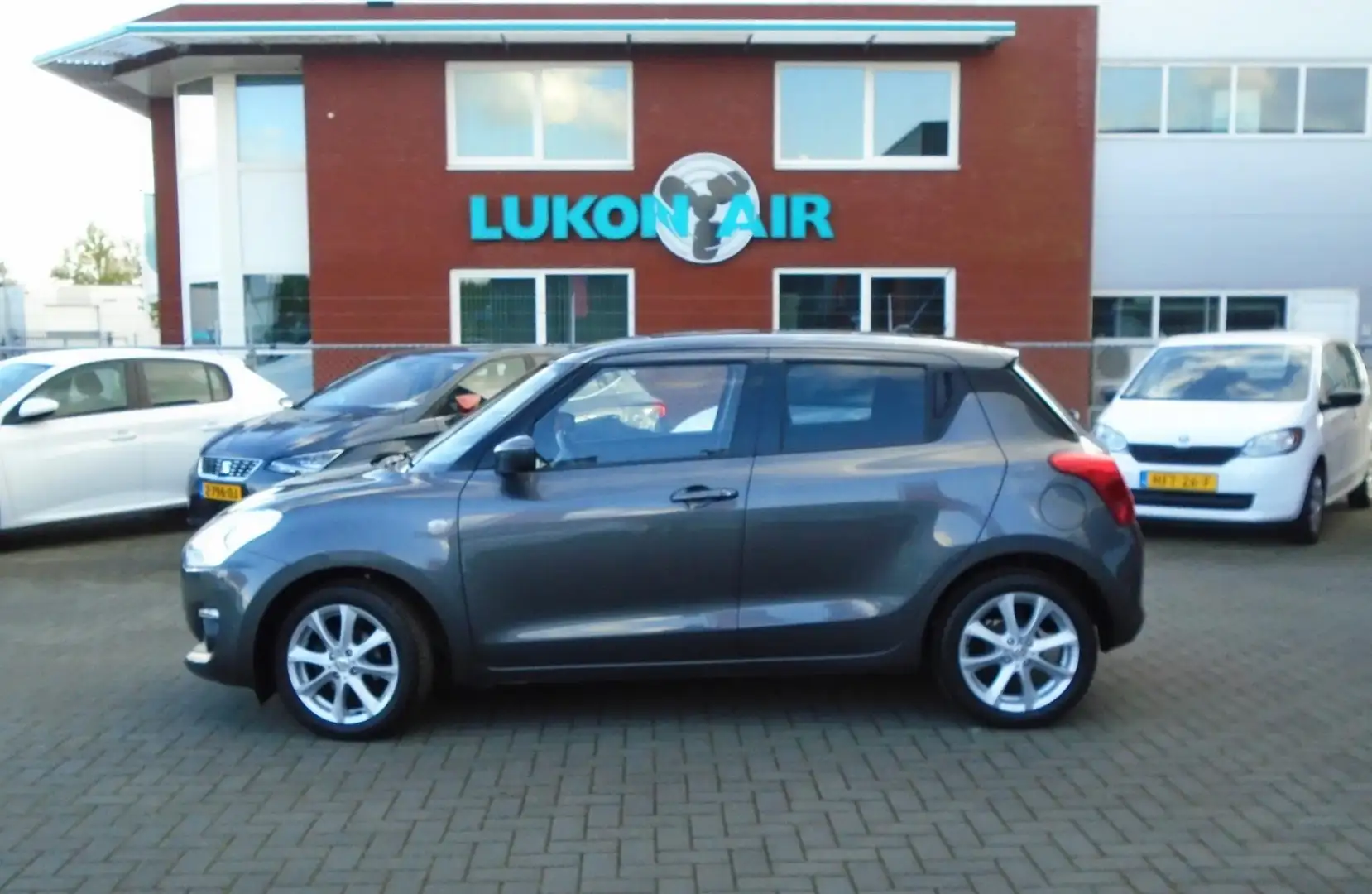 Suzuki Swift 1.2 Comfort, A-Camera,16''LM-V,Airco Grijs - 2