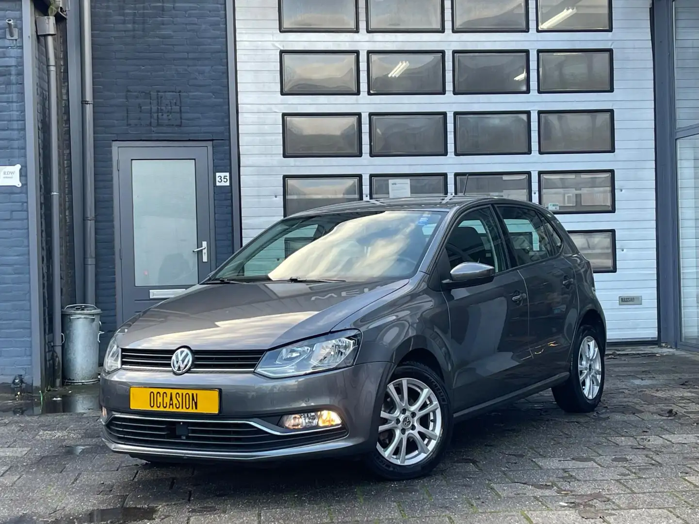 Volkswagen Polo 1.2 TSI Comfortline | Clima | PDC V+A | Automaat Gris - 1