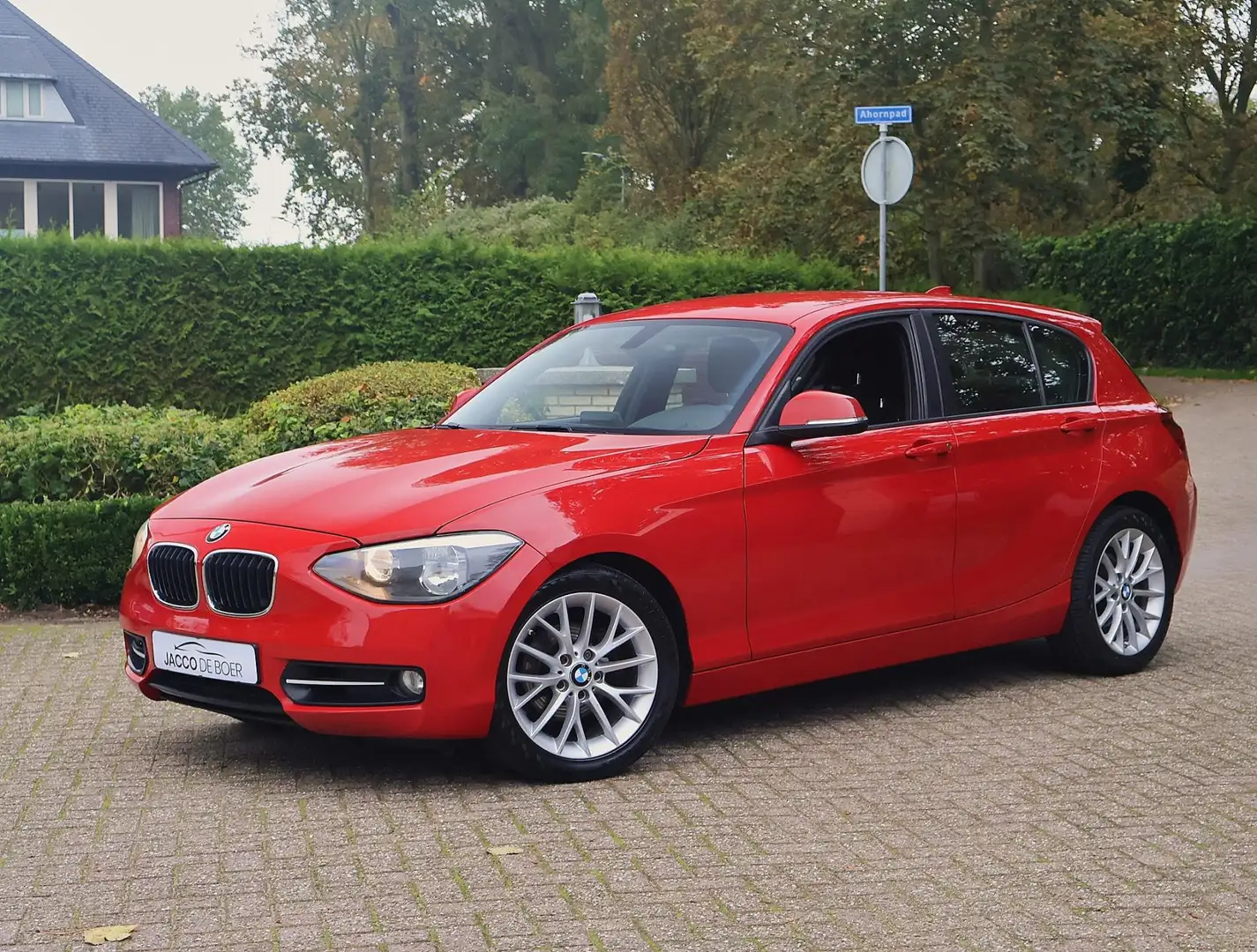 BMW 116 1-serie 116i 5-deurs Sportline 136pk Rosso - 1