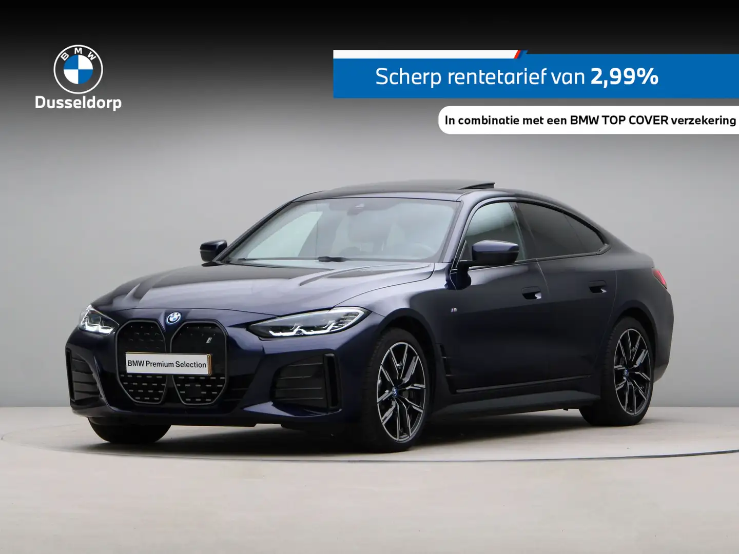 BMW i4 eDrive40 High Exe M-Sport 84 kWh Blauw - 1