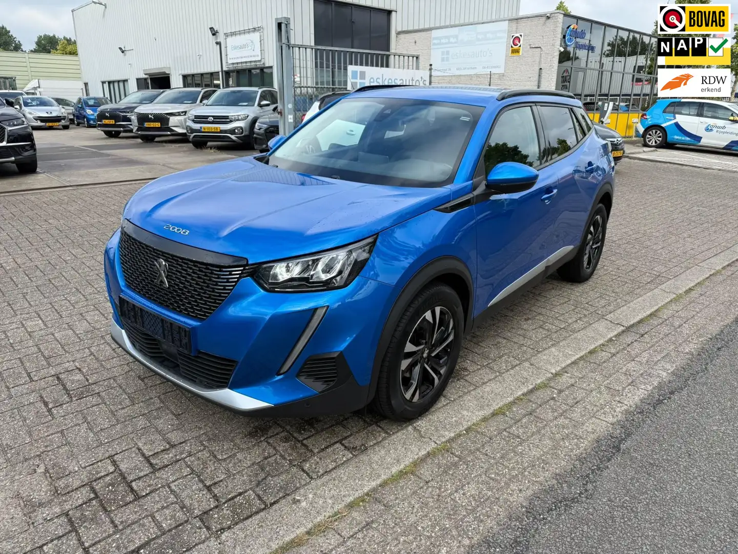Peugeot 2008 1.2 PureTech Allure 130PK, Navigatie, 12 mnd Garan Blu/Azzurro - 1