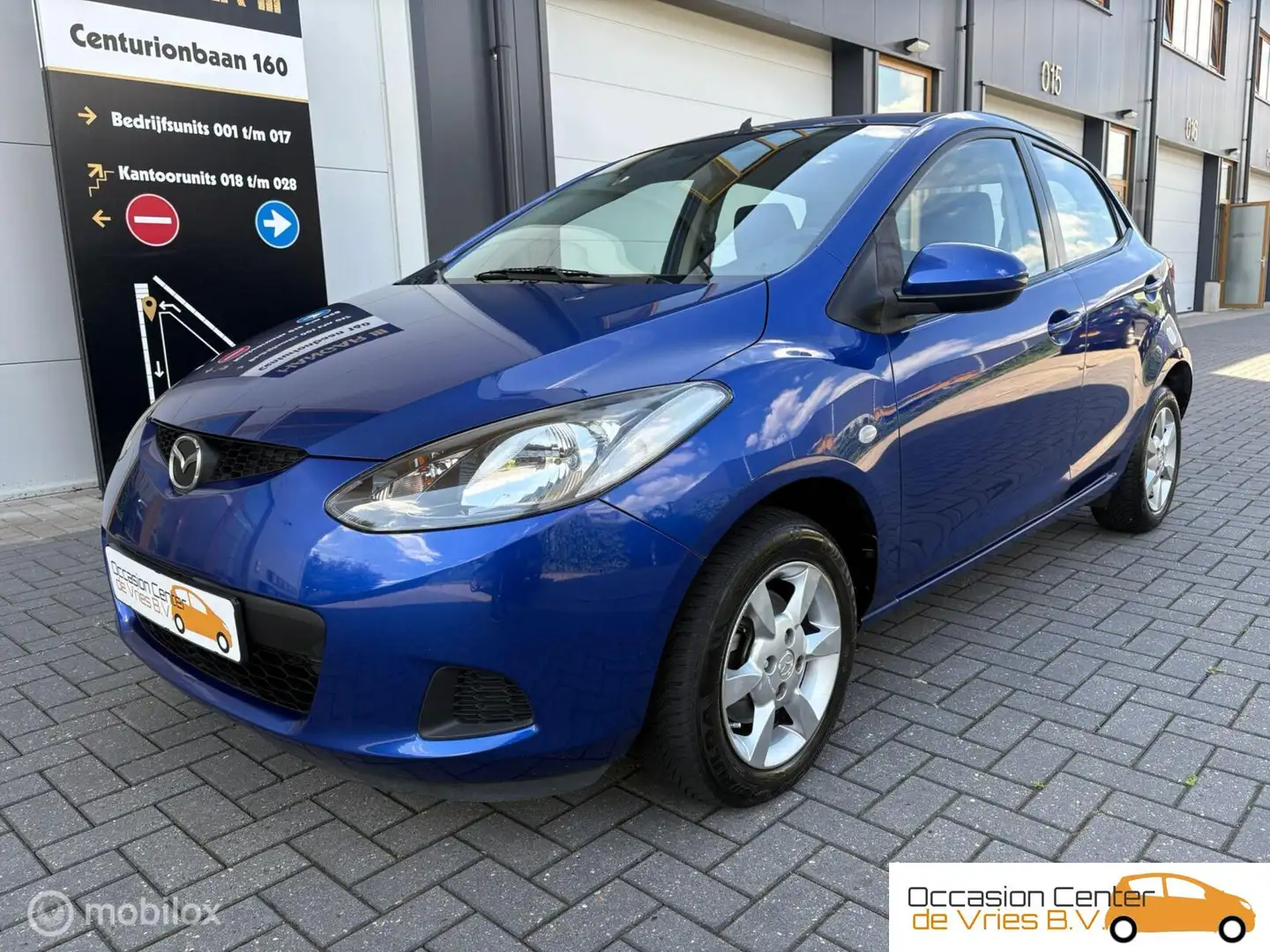 Mazda 2 1.3 5-deurs Airco Velgen Elektrisch Pakket Bluetoo Blauw - 2