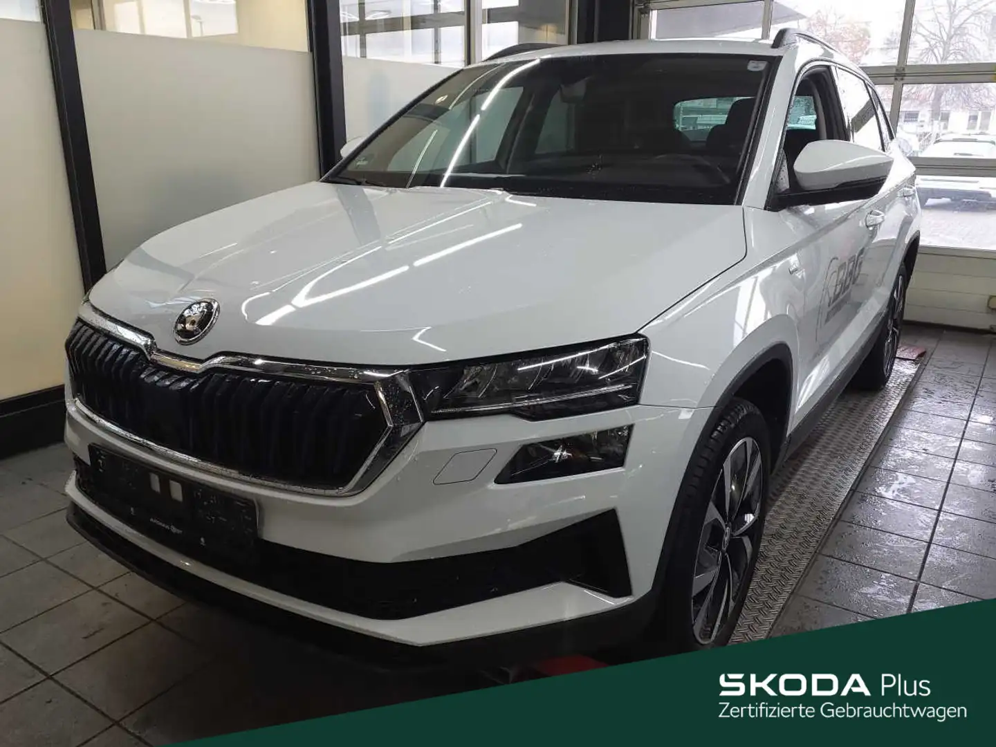Skoda Karoq Tour 1.5 TSI DSG Tour*NAVI*AHK*TRAVELLER Weiß - 1