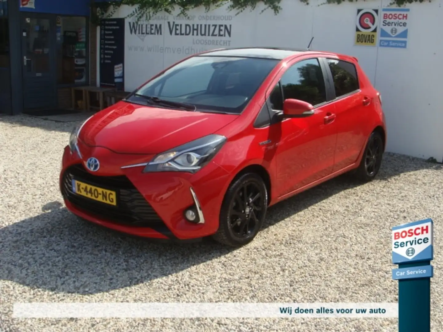 Toyota Yaris 1.5 Hybrid 5drs Automaat Premium Rouge - 1