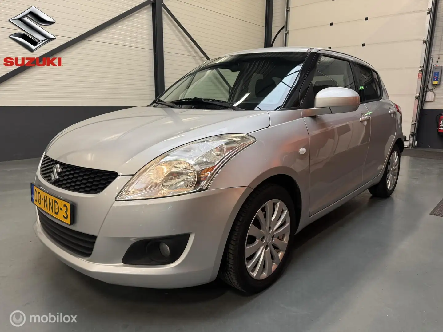 Suzuki Swift 1.2 Exclusive Carplay|Clima|Cruise|NL-Auto! Grau - 1