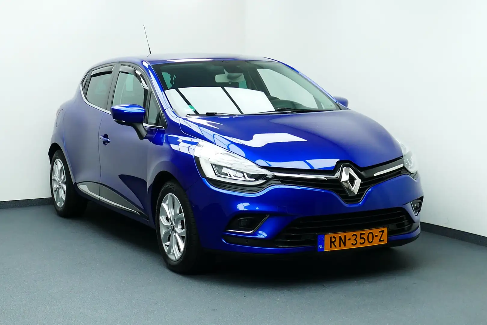 Renault Clio 1.2 120pk TCe Intens. Navi, Camera, Clima, Cruise, Blauw - 1