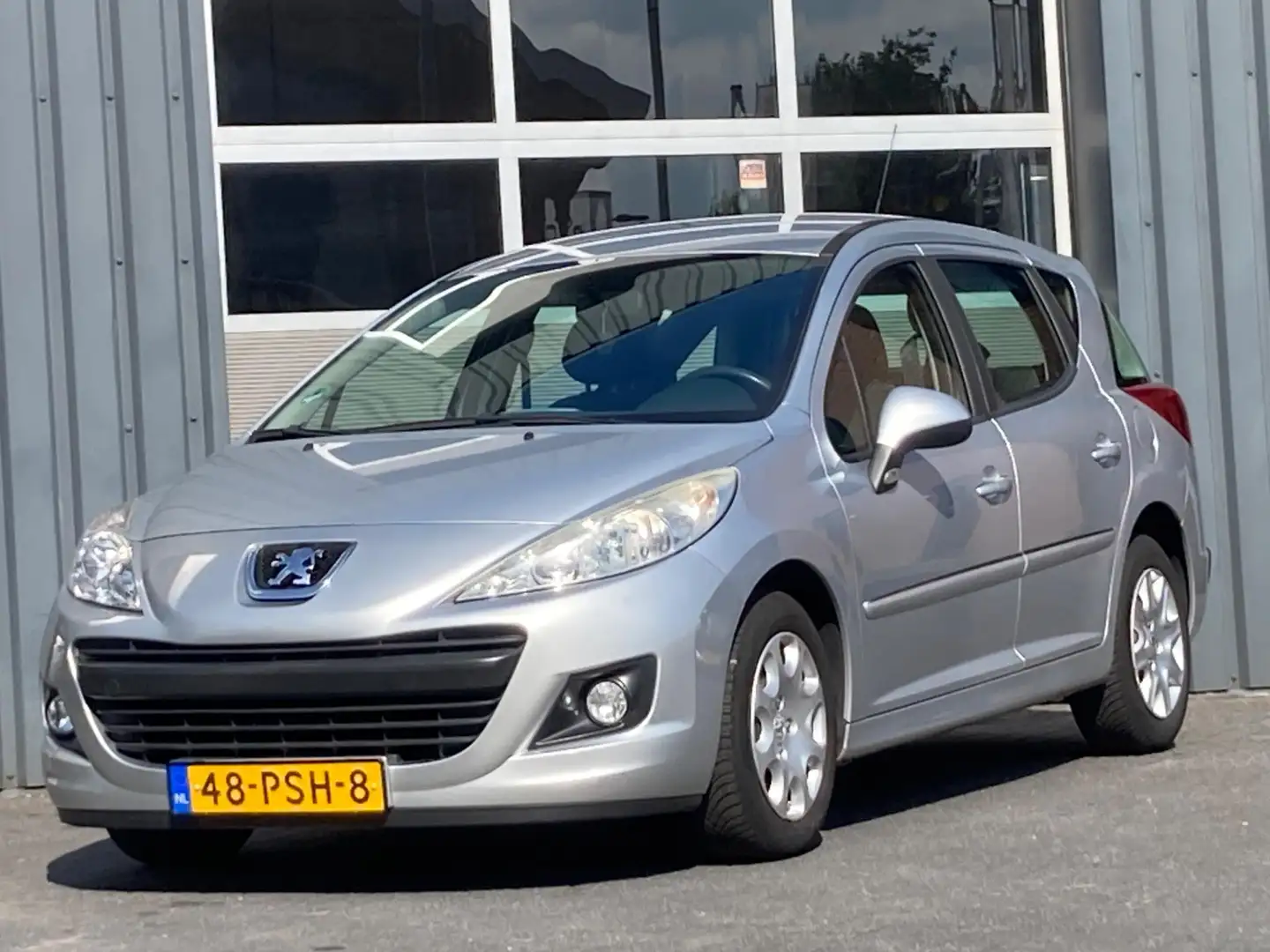 Peugeot 207 SW 1.4 VTi Blue Lease Airco Cruise controle Apk 17 Grijs - 1