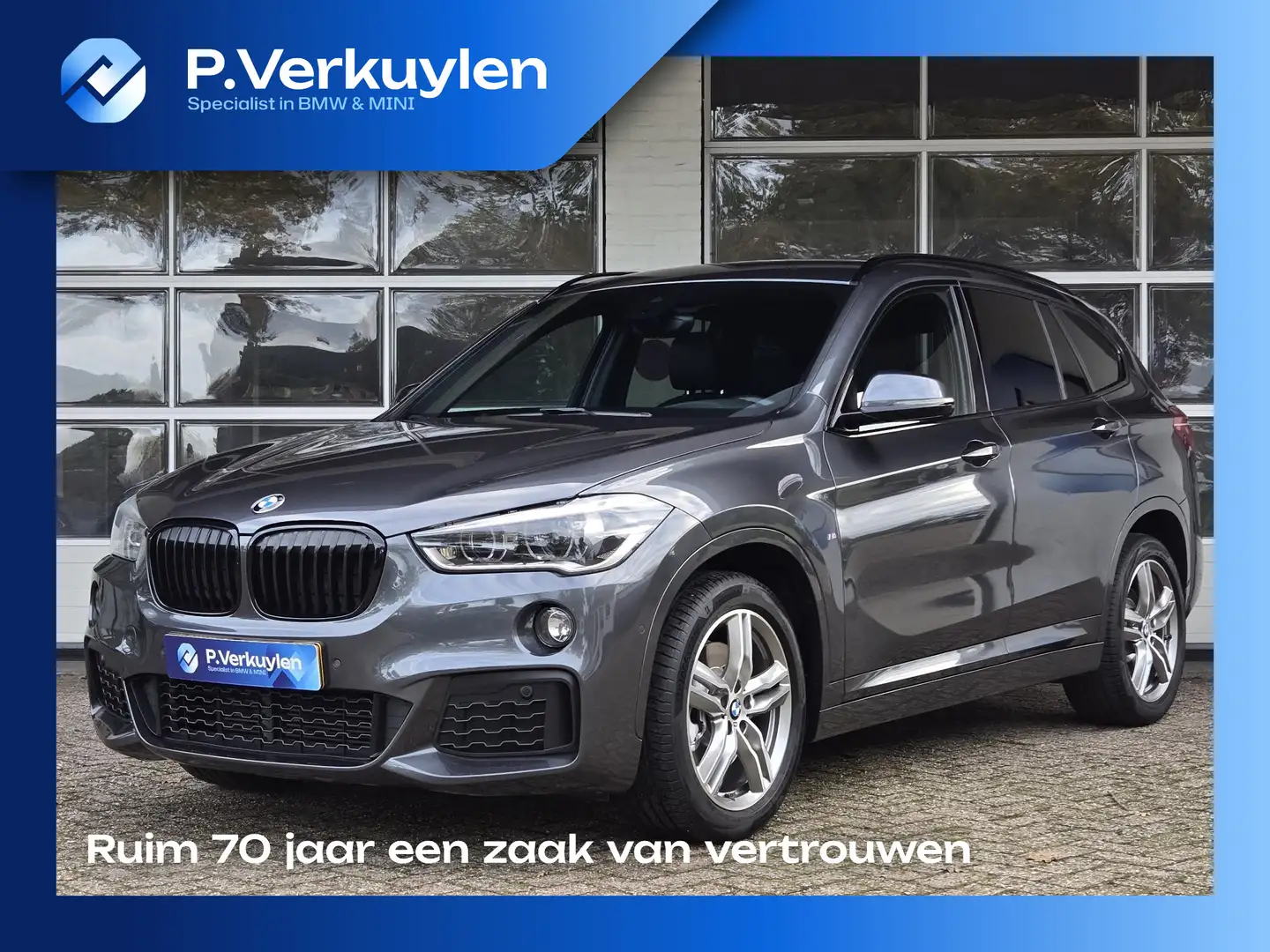 BMW X1 sDrive20i M SPORT | LEDER | TREKHAAK | NAVIGATIE | Gris - 1