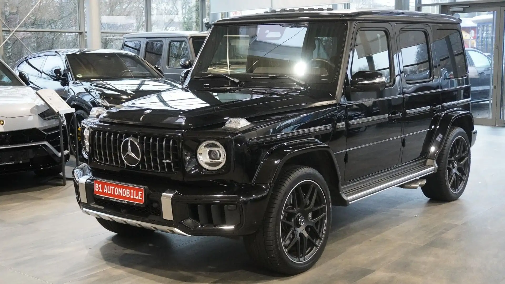 Mercedes-Benz G 63 AMG *AHK*STAHZ*GLASDACH*22 ZOLL* FACELIFT* Schwarz - 1