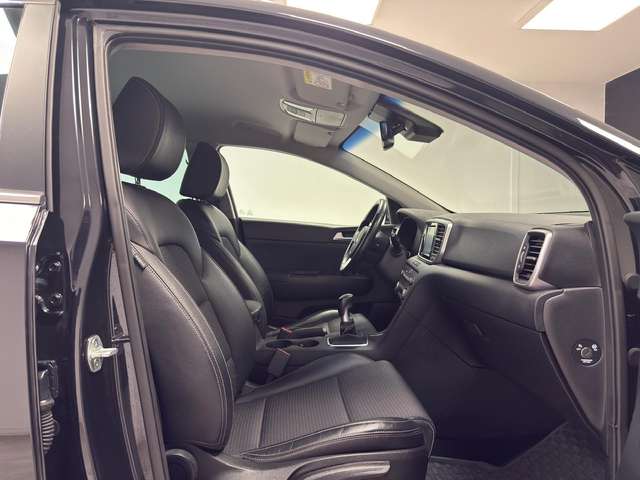 Kia Sportage — photo 12