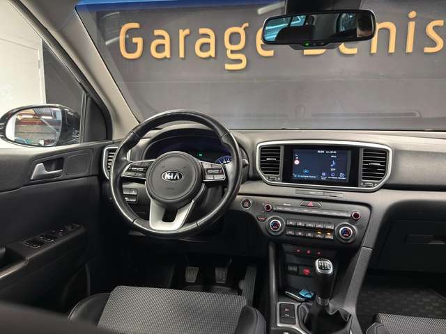 Kia Sportage — photo 10