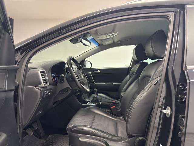 Kia Sportage — photo 11
