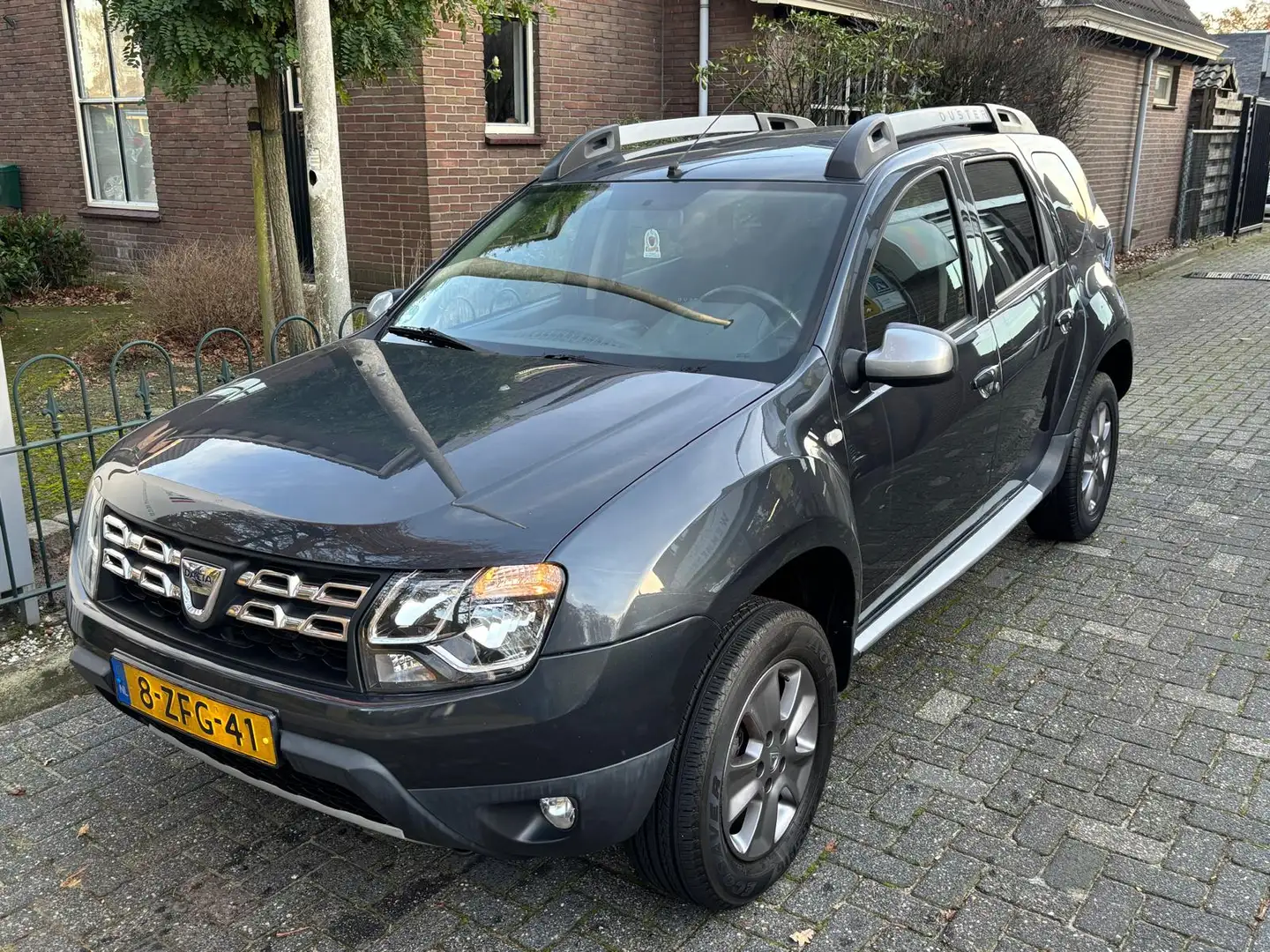 Dacia Duster 1.2 TCe 4x2 Prestige Airco/Alu wielen/Dakrail/Nieu Grijs - 2