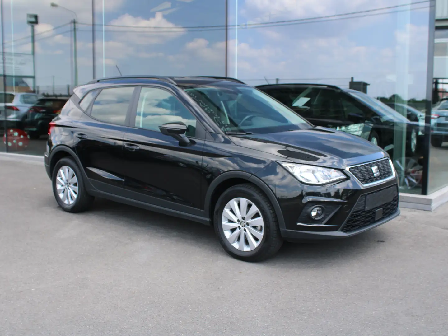 SEAT Arona 1.0 TSI-81KW-DSG-AIRCO-NAVI-BLUETOOTH-ALU V-PDC Zwart - 1