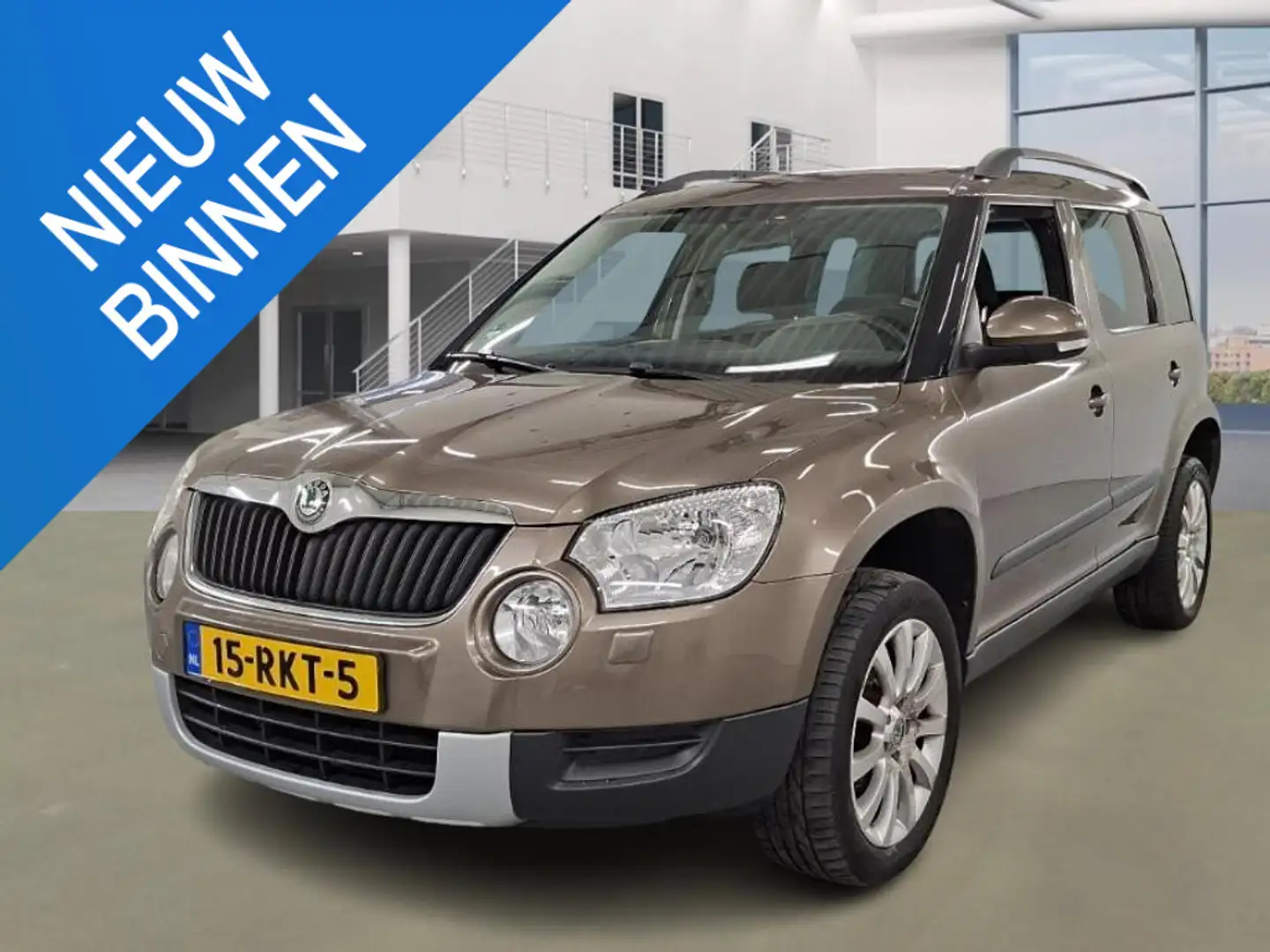 Skoda Yeti 1.2 TSI Elegance PANORAMADAK, trekhaak, clima, LMV Braun - 1