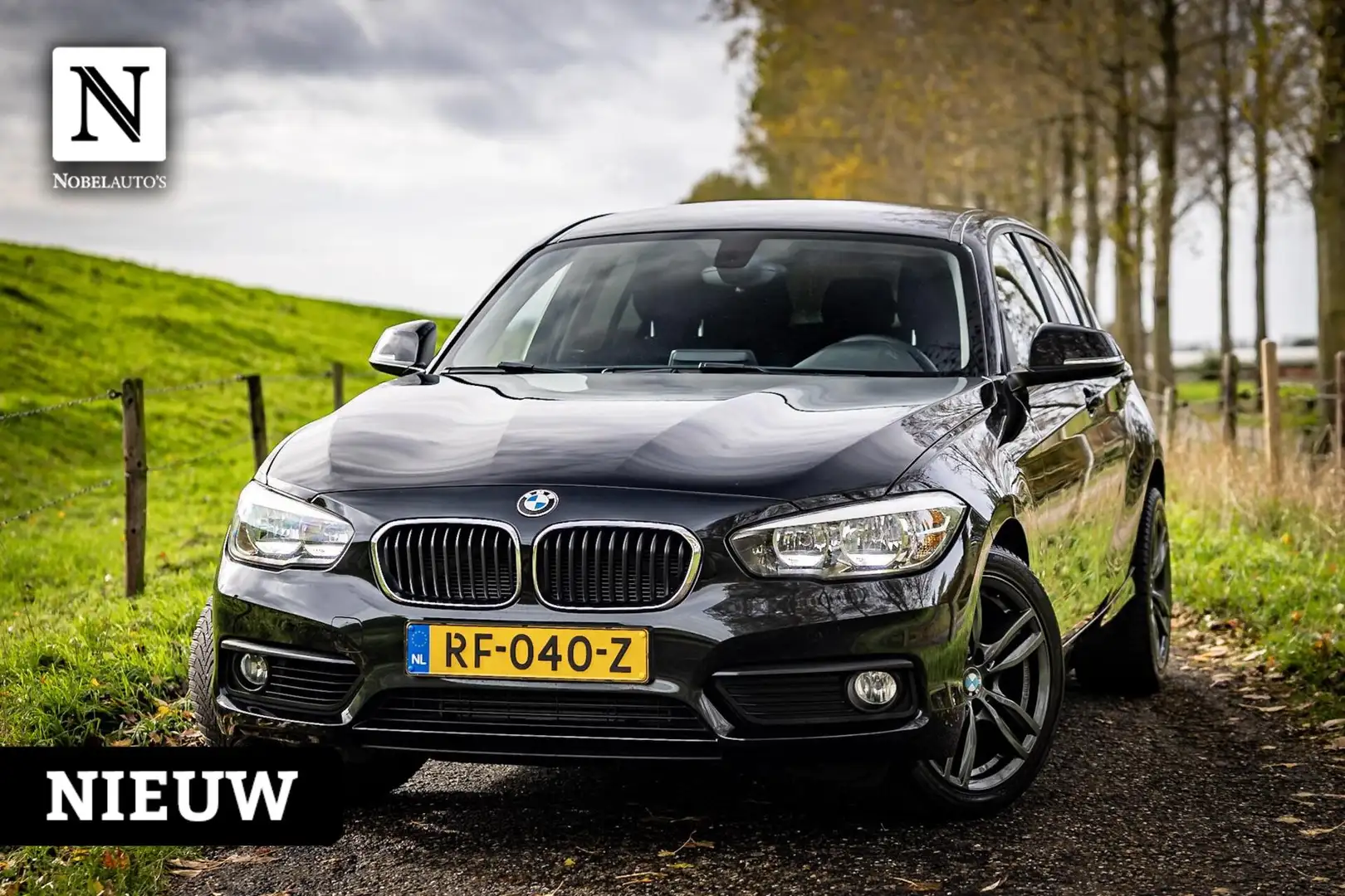 BMW 118 1-serie 118i Corporate Lease | Automaat | 5 Deurs Zwart - 1