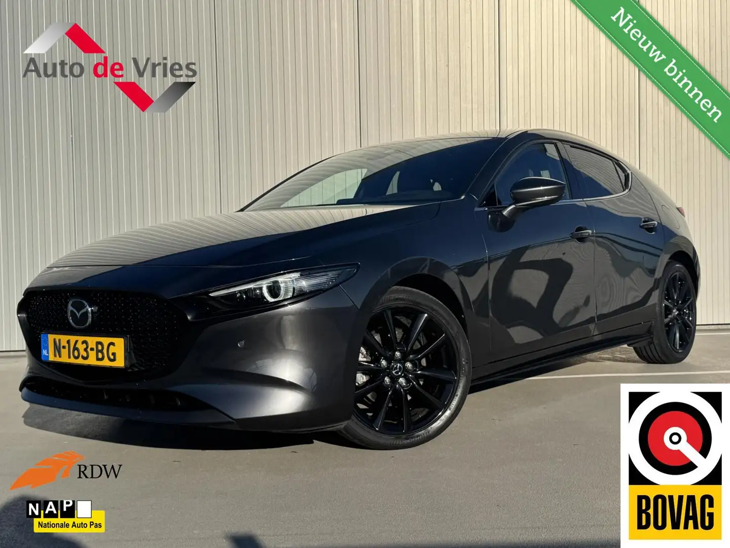 Mazda 3 2.0 e-SkyActiv-X M Hybrid 186 Luxury|Navi|Leder Grijs - 1