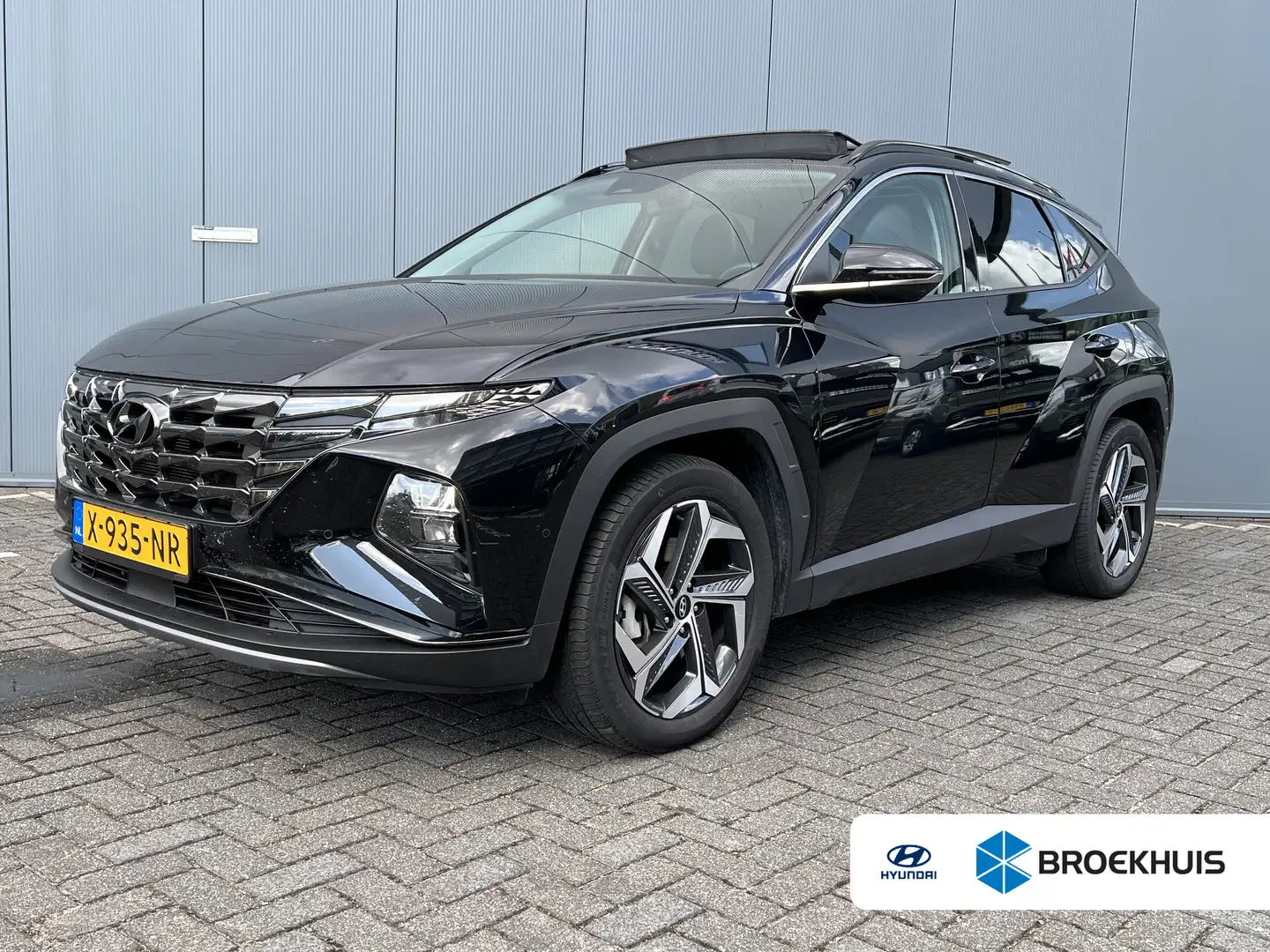 Hyundai TUCSON 1.6 T-GDI 265pk PHEV Premium Sky 4WD | Leder | Sch Schwarz - 1