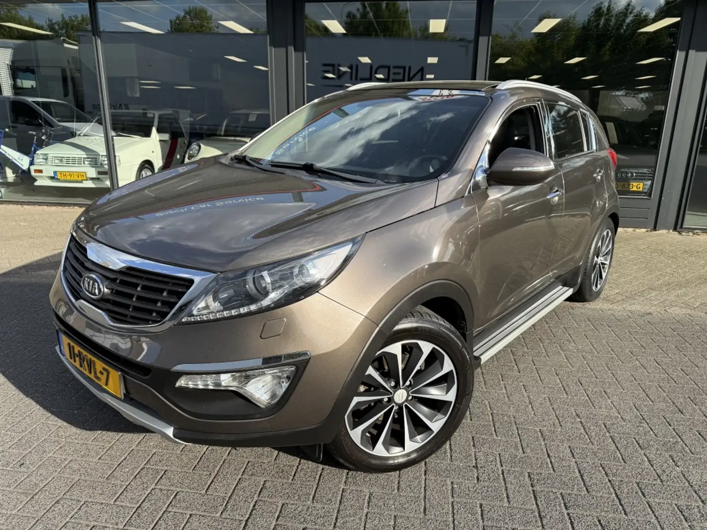 Kia Sportage 2.0 Comfort Pack AWD gas Brun - 1