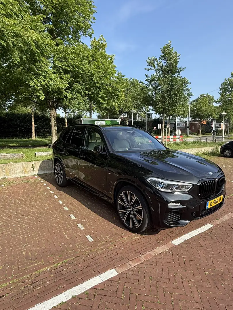 BMW X5 4.5e M-Sport Orginele Nederlandse auto met NAP! Zwart - 1