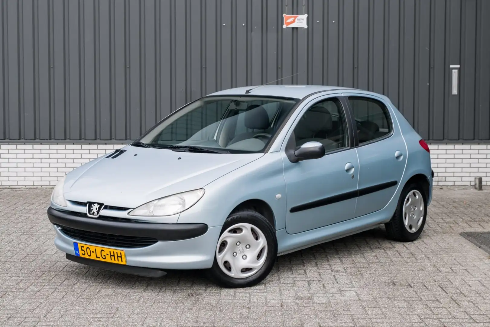 Peugeot 206 1.4 X-line*5-Deurs*Lage KM* Grau - 1