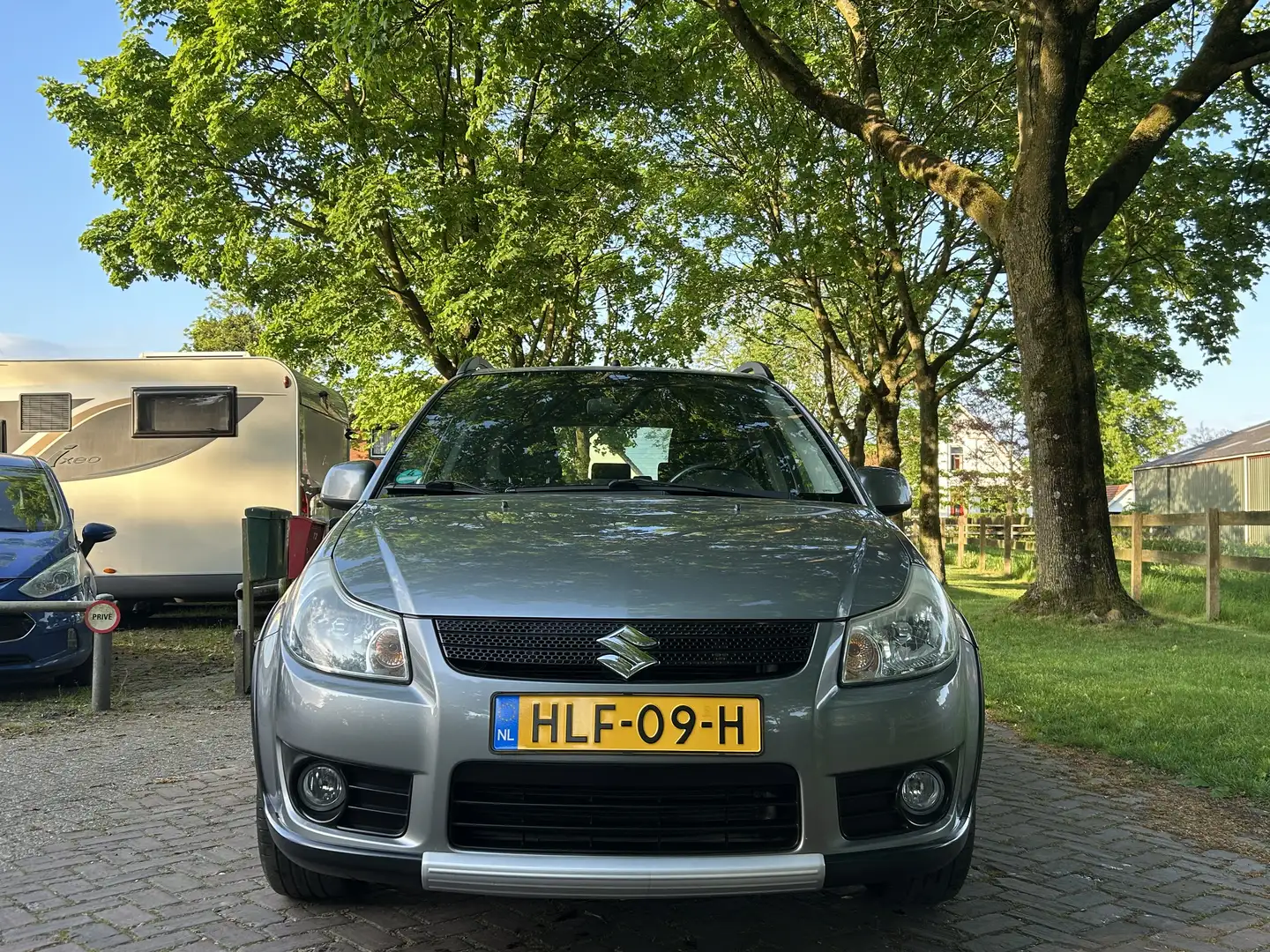 Suzuki SX4 1.6 Elekpakket,Navi,Stoelverwarming,LMV16” Gris - 2