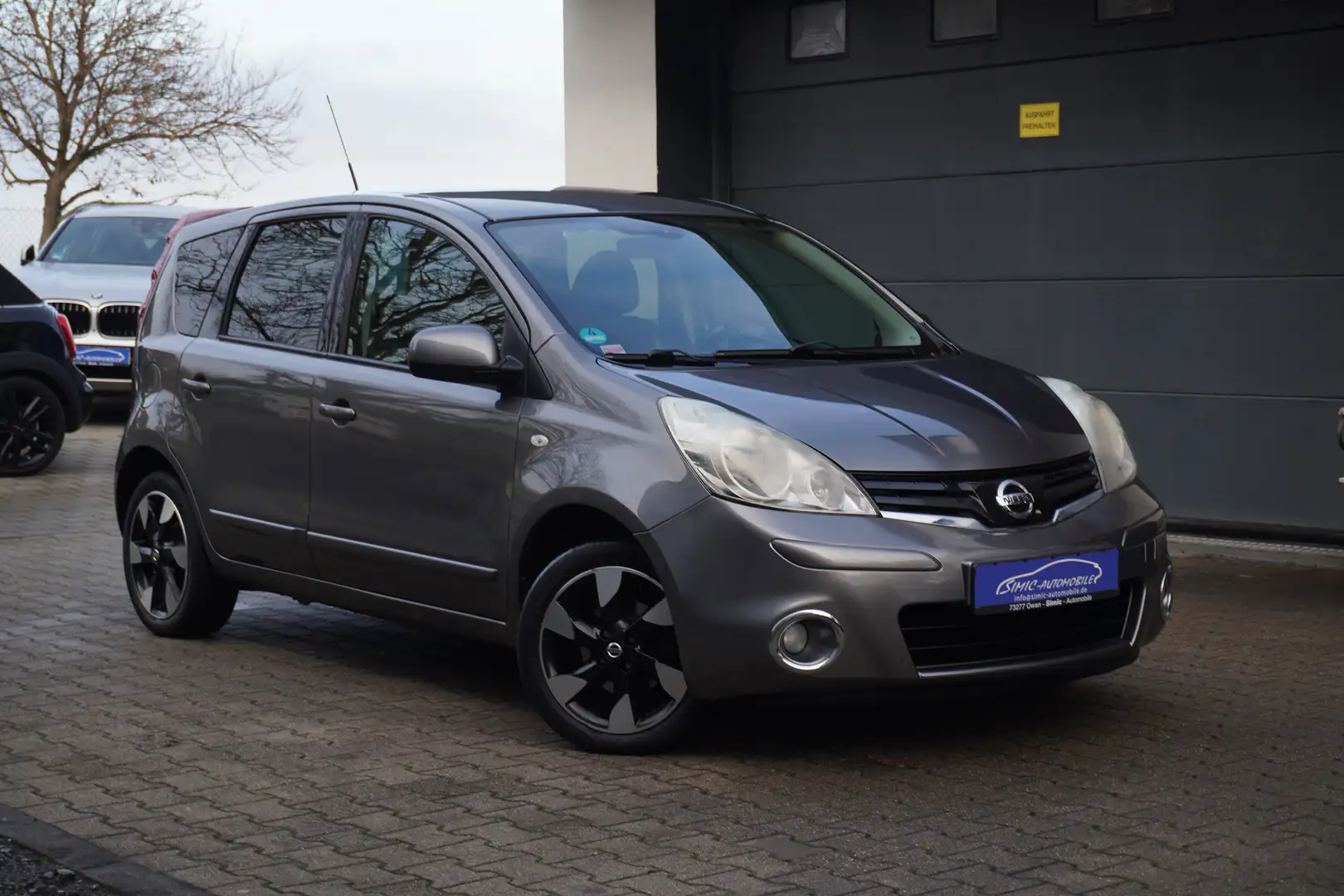 Nissan Note 1.4 I-Way+ tLEDER+NAVI+KLIMA+ALU+PDC+1Hd+Org115Tkm Grau - 1
