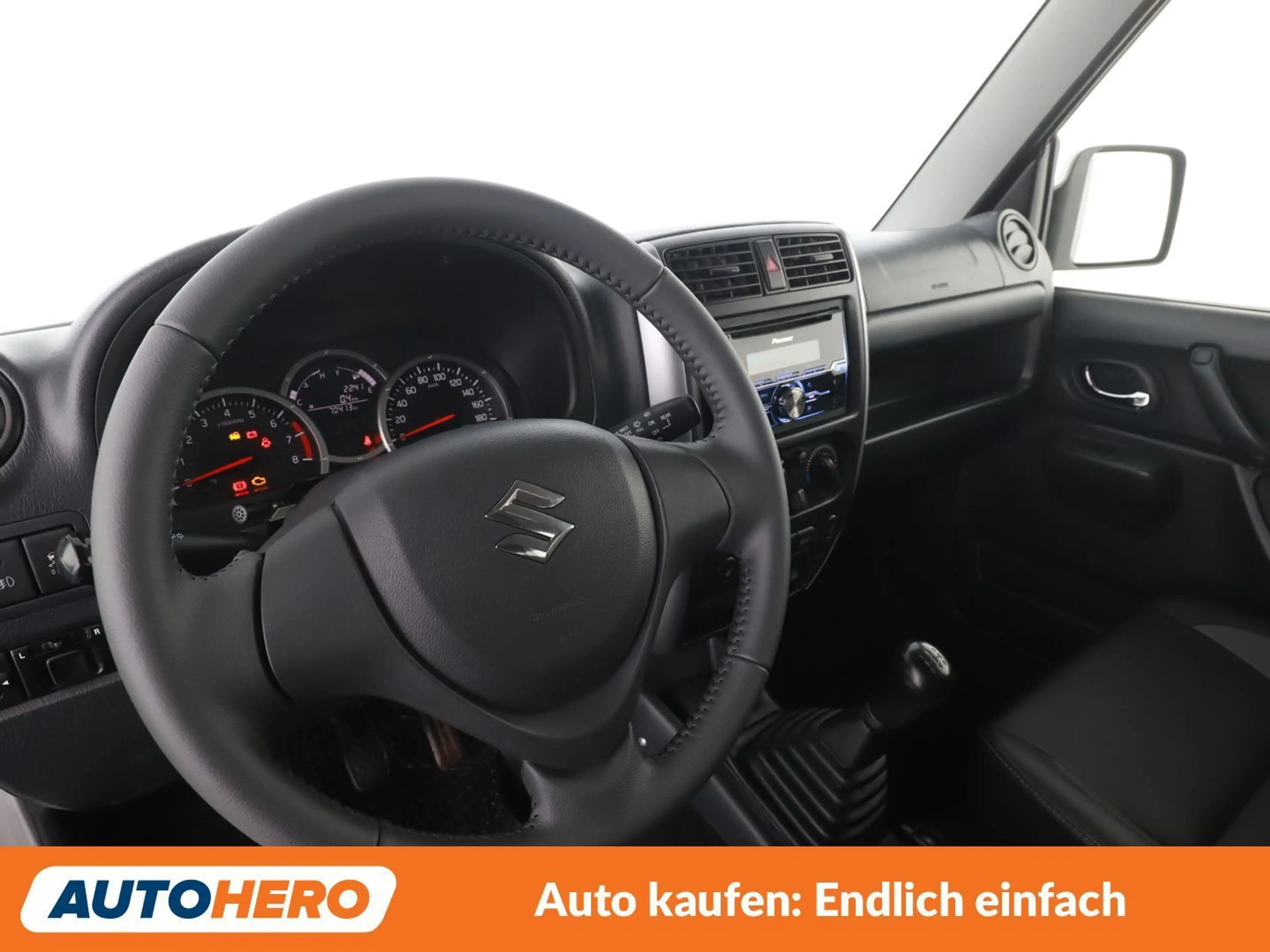 Suzuki Jimny 1.3 Deluxe — photo 11