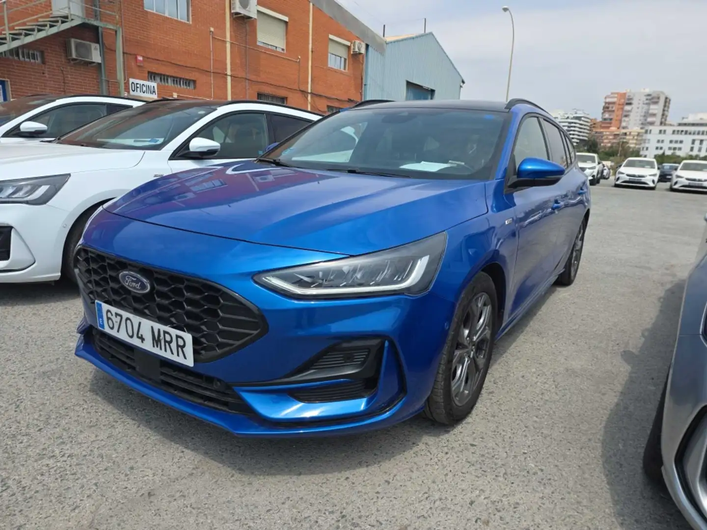 Ford Focus Sportbreak 1.0 Ecoboost MHEV ST-Line 155 Aut. Blauw - 1