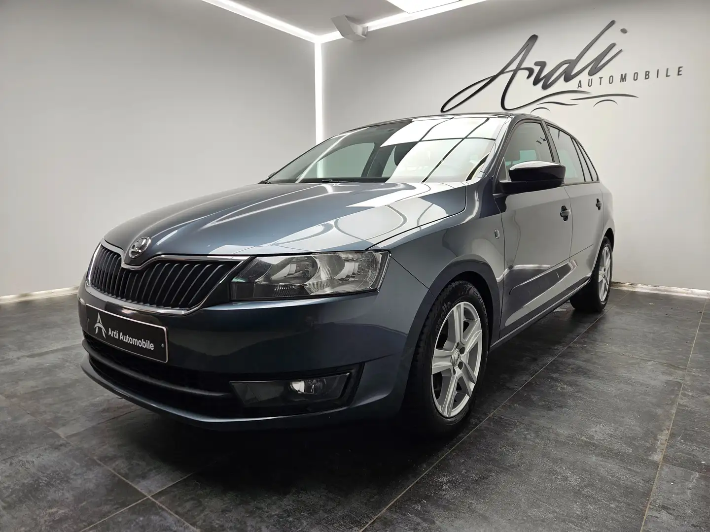 Skoda Rapid/Spaceback 1.2 TSI*1ER PROP*GARANTIE*TOIT PANO*GPS*CLIM* Gris - 1