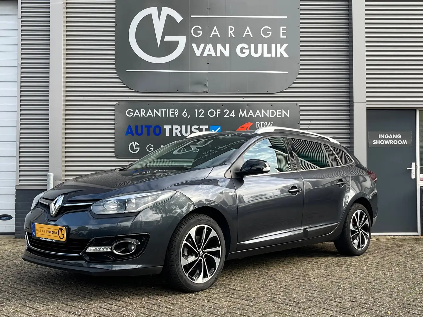 Renault Megane Estate 1.2 TCe Bose 131PK Trekhaak,Navi,Clima,Crui Gris - 1