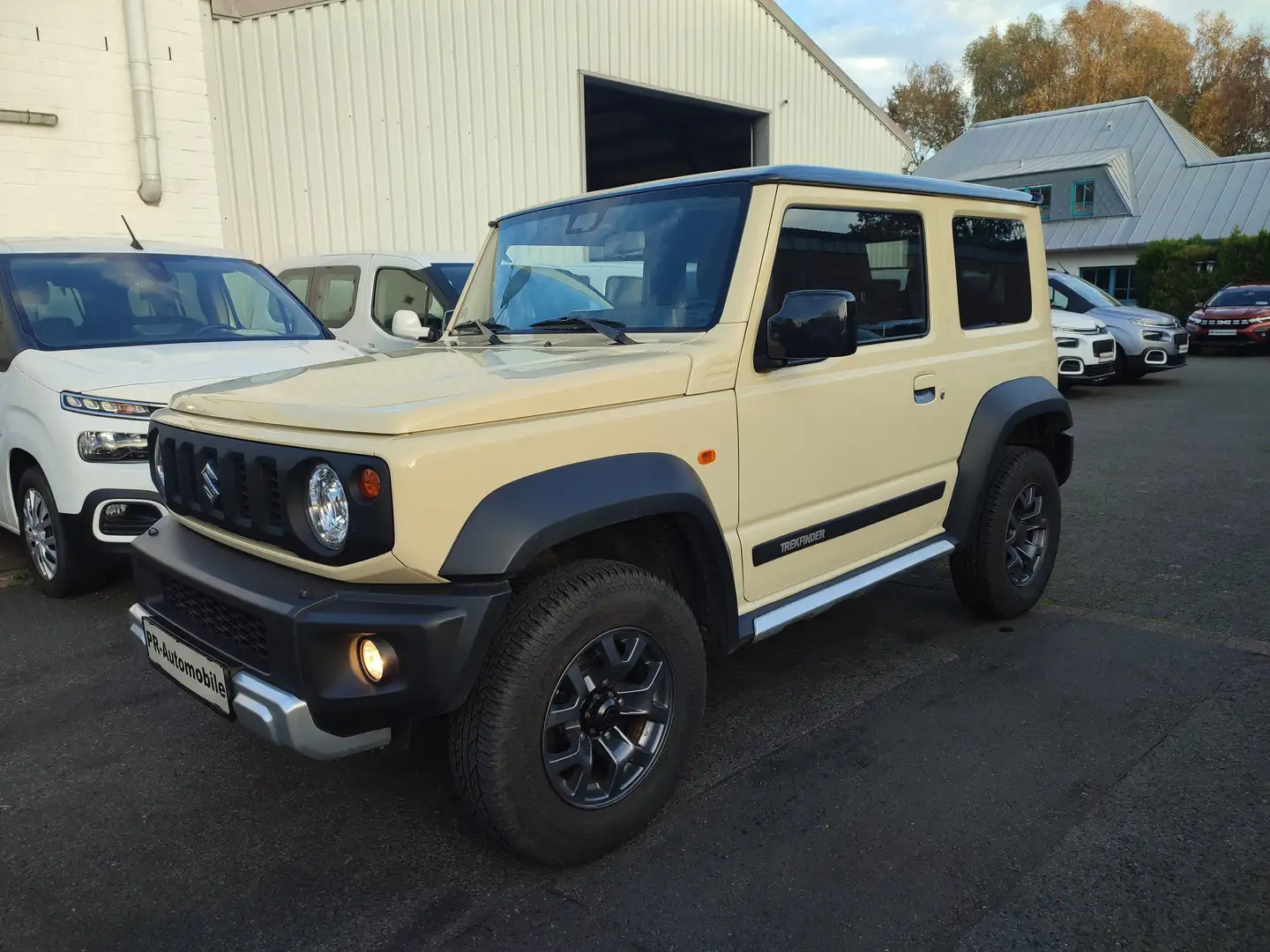 Suzuki Jimny Jimny 1.5 ALLGRIP Comfort+ Klimaaut/Navi+Cam Beige - 1