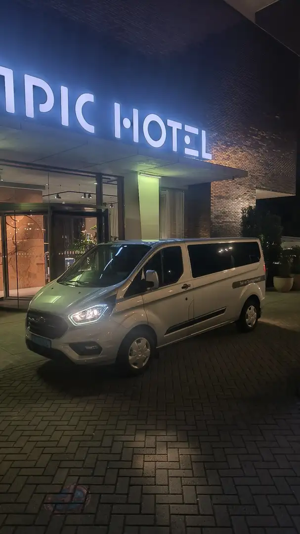 Ford Transit Custom 320 2.0 TDCI L2H1 Taxiklaar Zilver - 1