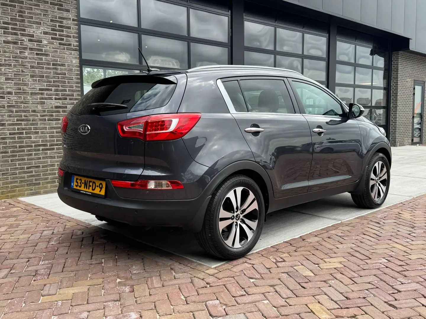 Kia Sportage 2.0 X-clusive | Navi | Cruise | Leer | Camera | Grijs - 2