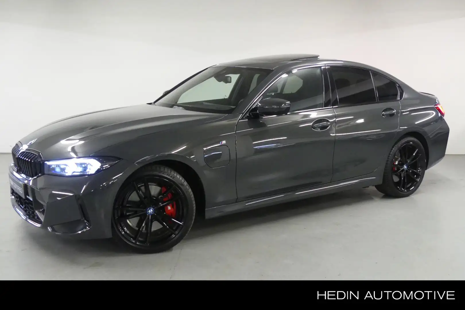 BMW 320 3-serie 320e | M Sportpakket Pro | Entertainment P Grijs - 1