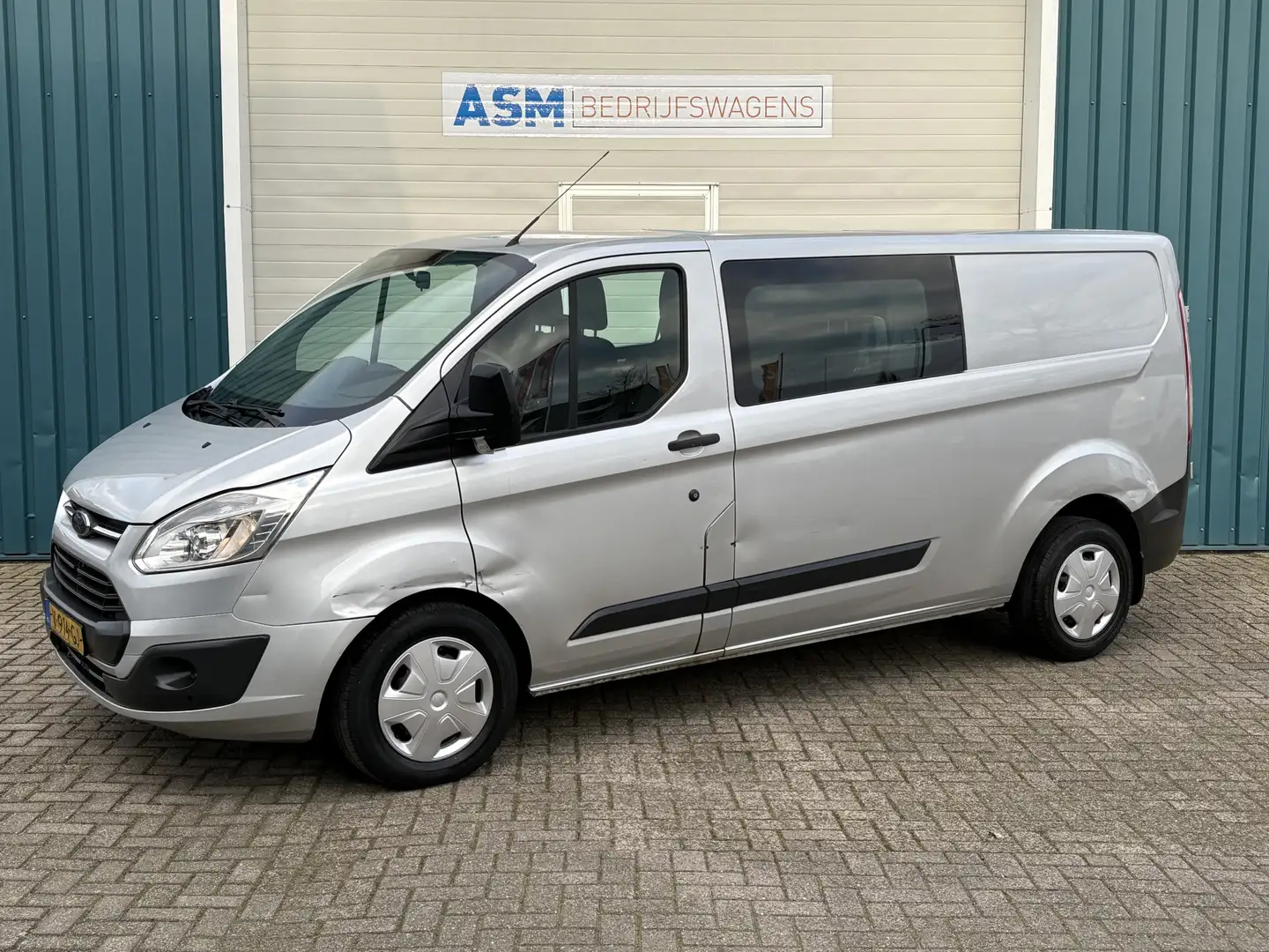 Ford Transit Custom 310 2.0 131Pk TDCI L2H1 Trend DC / Cruise Grijs - 1