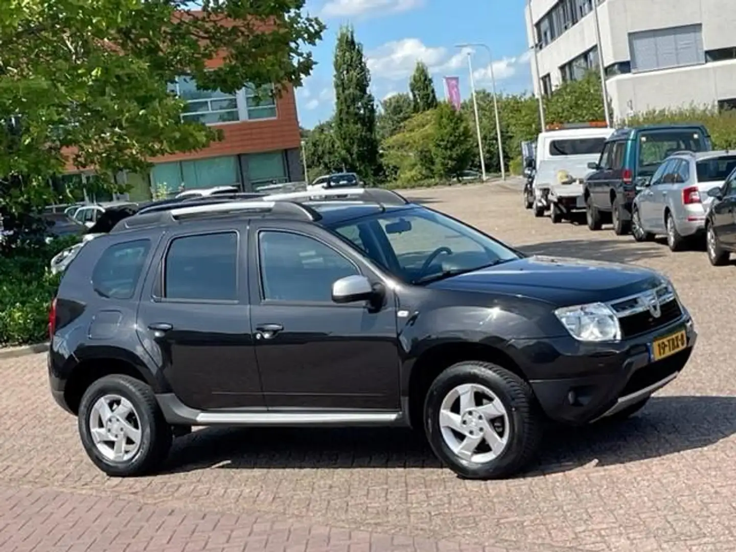 Dacia Duster 1.6 Aniversare 2wd,bj.2012,kleur:zwart,airco,leder Zwart - 2