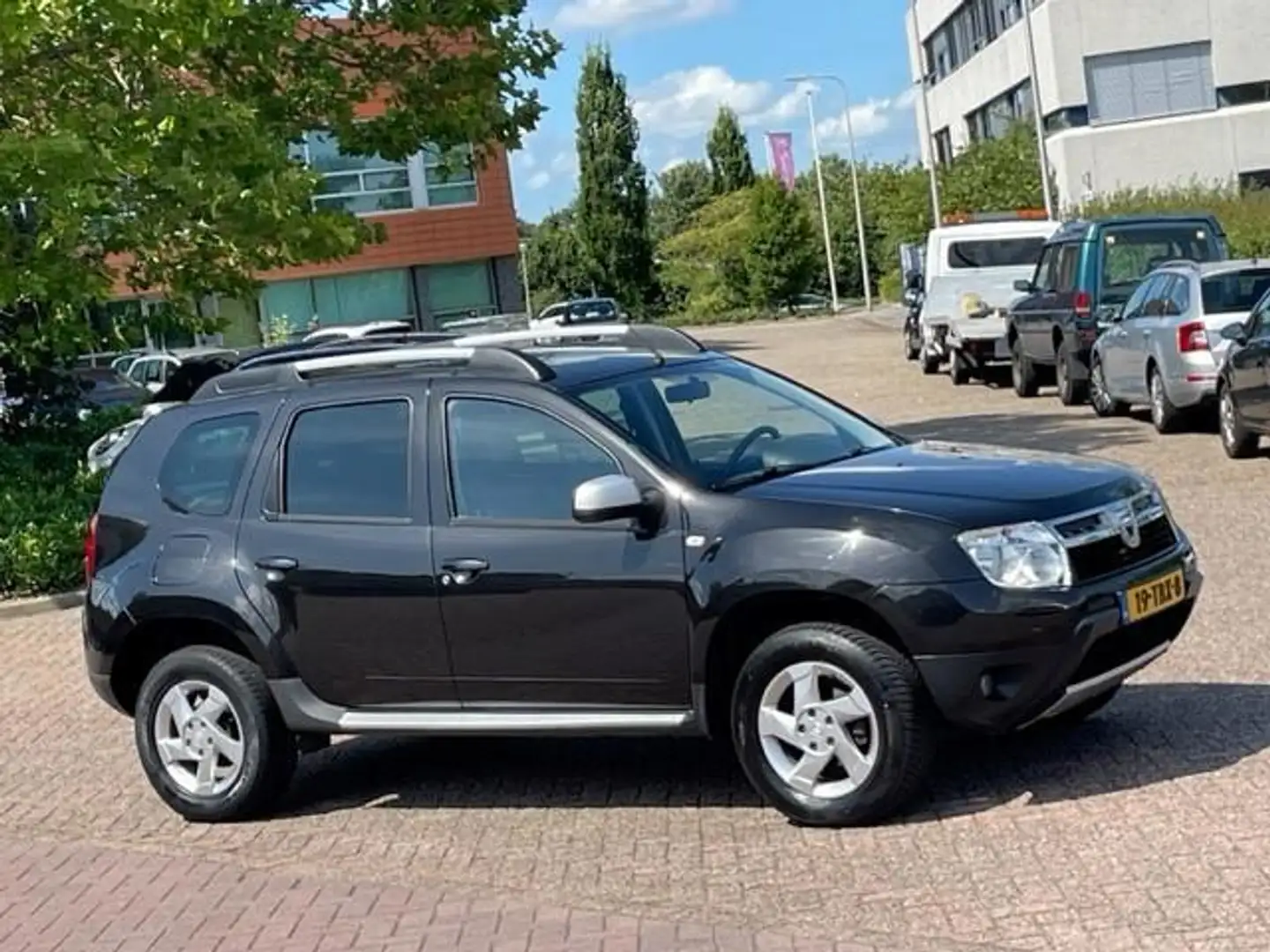 Dacia Duster 1.6 Aniversare 2wd,bj.2012,kleur:zwart,airco,leder Zwart - 2