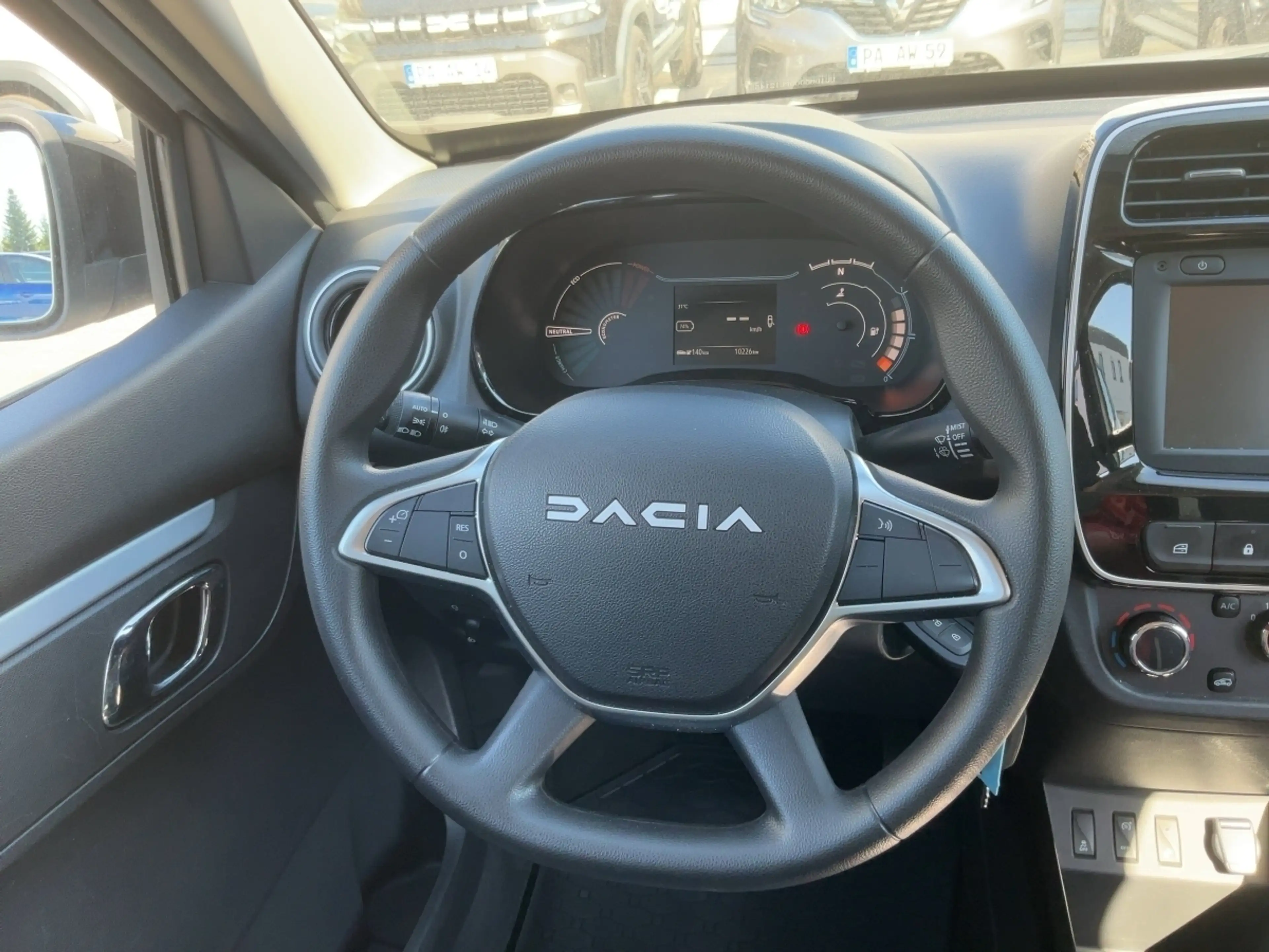 Dacia Spring Essential — photo 10