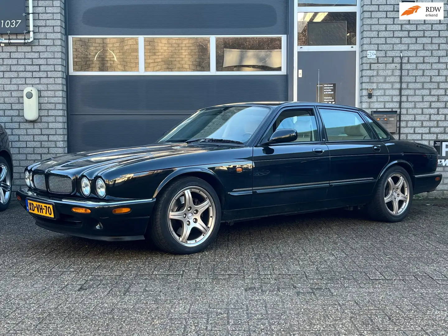 Jaguar XJR 4.0 V8 SUPERCHARGET NL auto boekjes T.I. Schwarz - 1