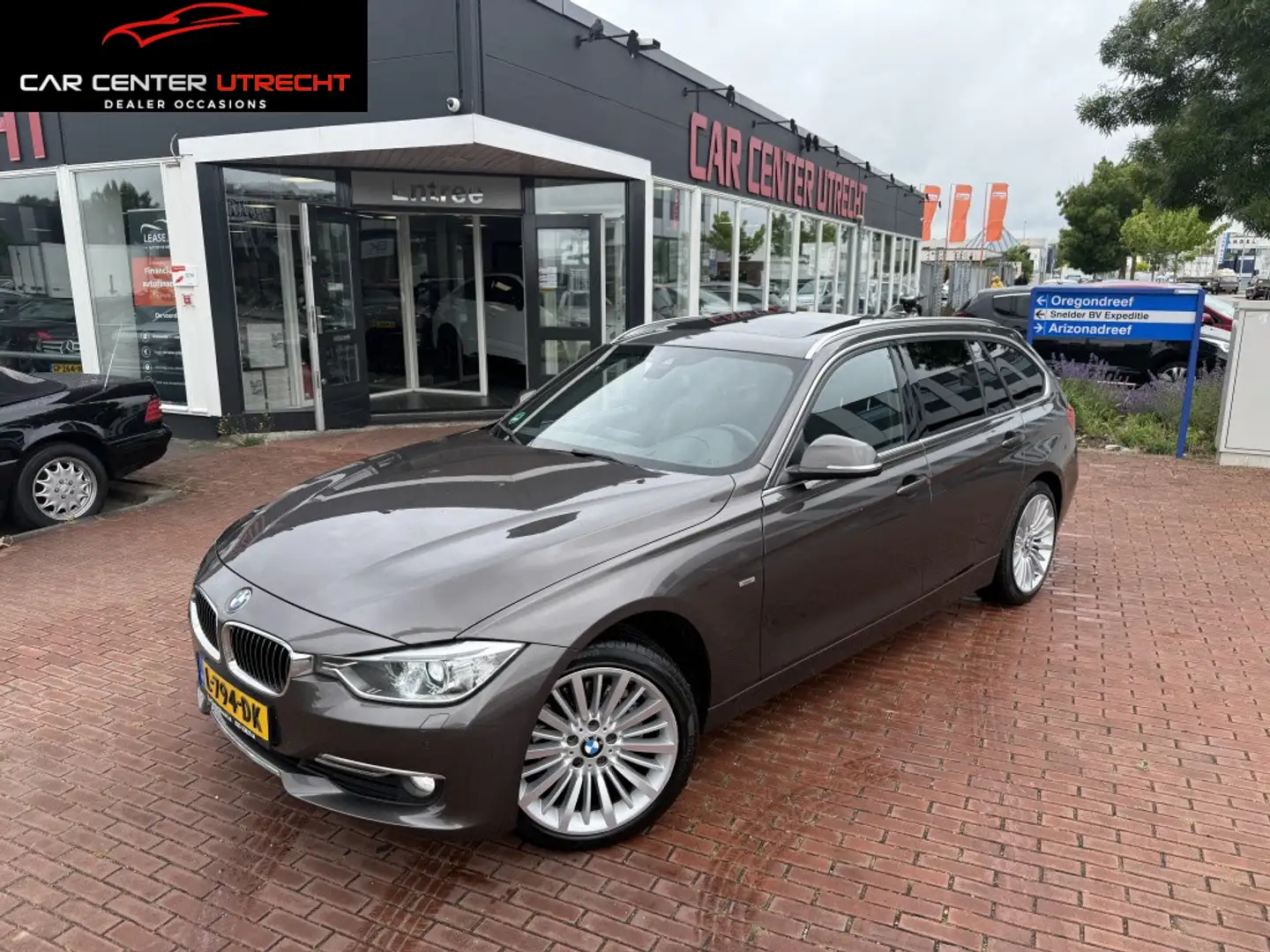 BMW 320 3-serie Touring 320d xDrive High Executive | Full Brown - 1