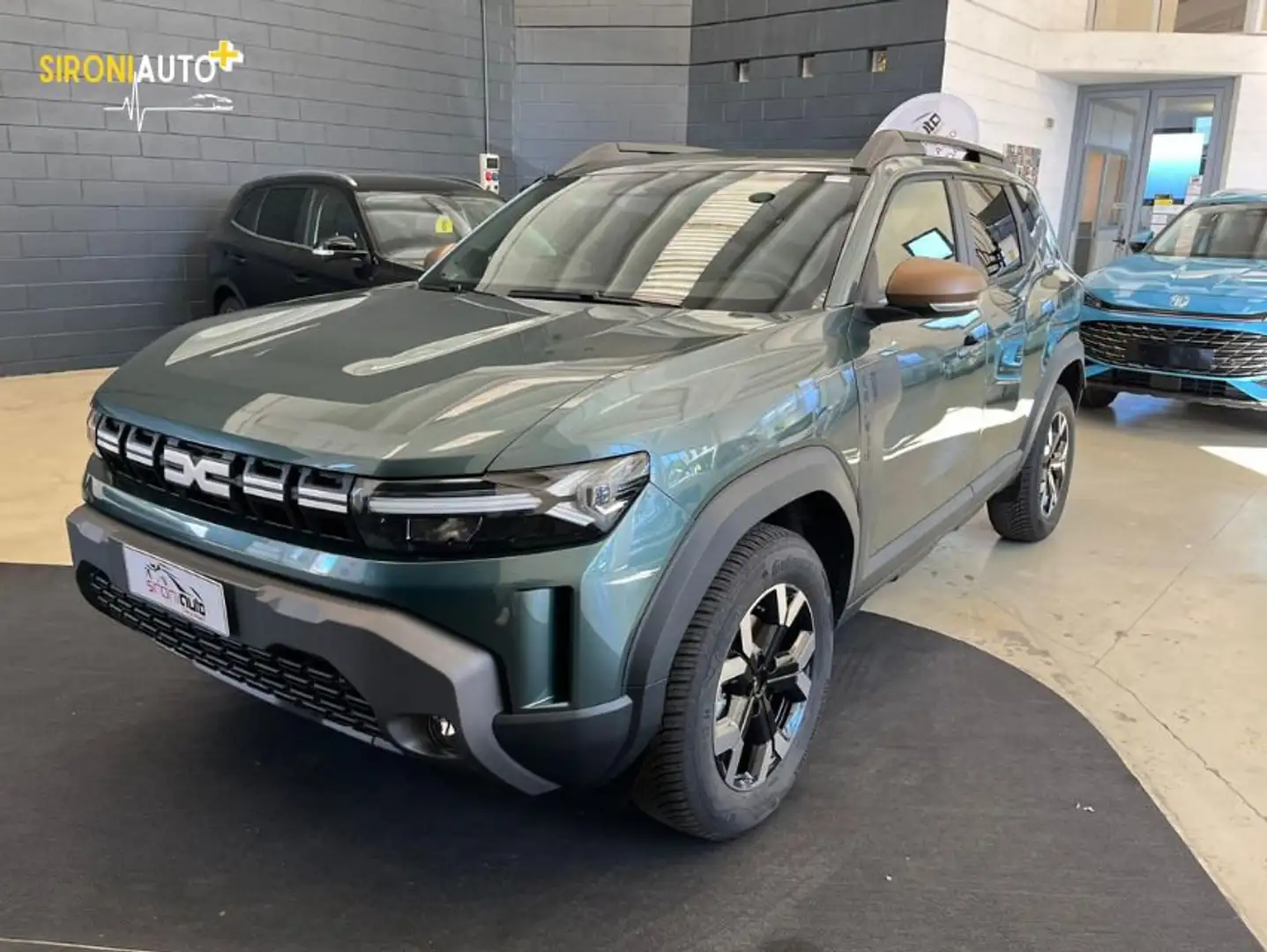 Dacia Duster Duster Tce 130 CV MHEV 4x4 Extreme - PROMO SIRONI Groen - 1