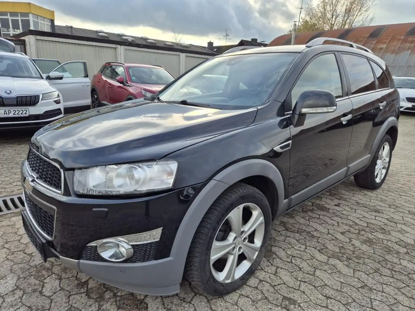 Chevrolet Captiva 2.2 D LTZ 4WD Automatik *7Stz*Leder*SD* Schwarz - 1