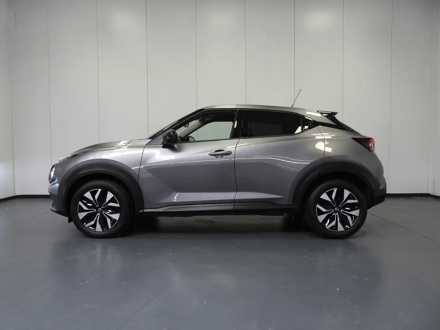 Nissan Juke 1.0 DIG-T Acenta NAVI-APP/CAMERA/LED/AIRCO/CRUISE! Grijs - 2