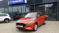 Suzuki Swift 1.2 Dualjet Hybrid 61 kW AllGrip Club Oranje - thumbnail 1