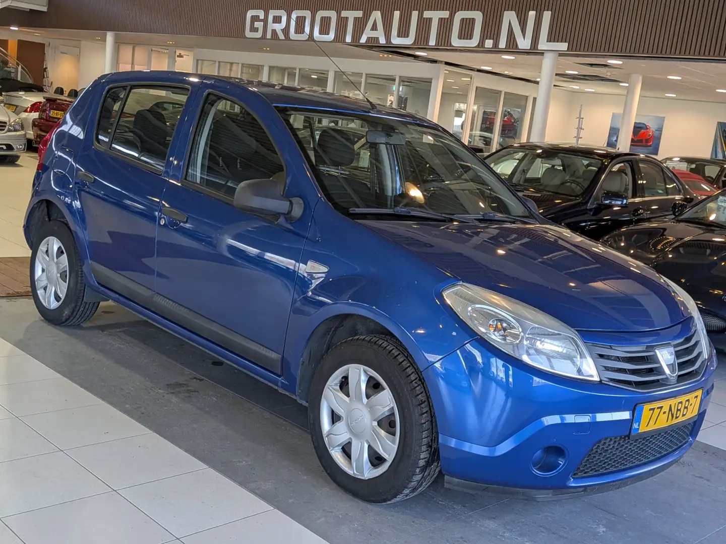 Dacia Sandero 1.2 Ambiance Volledig onderhouden, NAP, Airco, Iso Blauw - 1