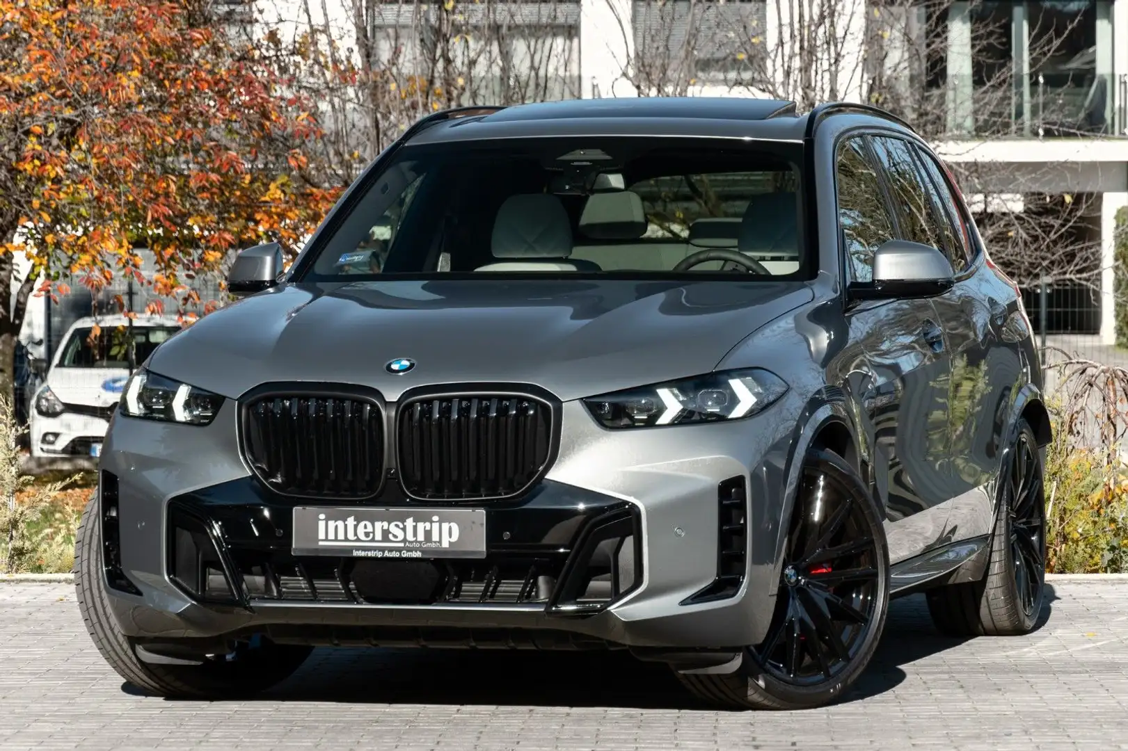 BMW X5 40d M SPORT.LUFTF.PANO.DR.ASS.PR.ASS.AHK.22" Grijs - 1