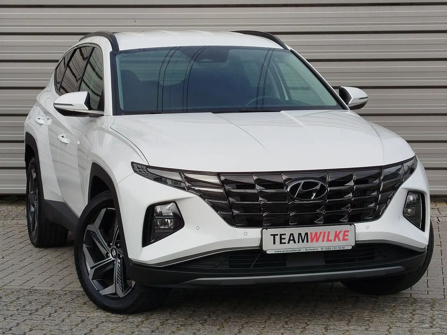 Hyundai TUCSON 1.6 T PluginHy 4WD LED Navi PDCvo+hi+Kam. Weiß - 1